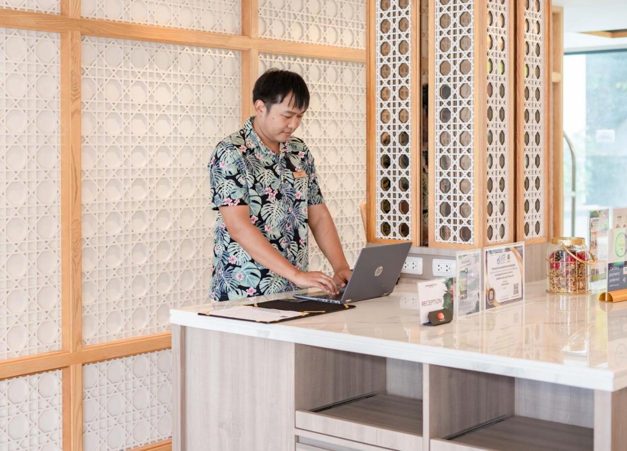 Skyview Resort Phuket Patong Beach Exterior photo A student working at the library