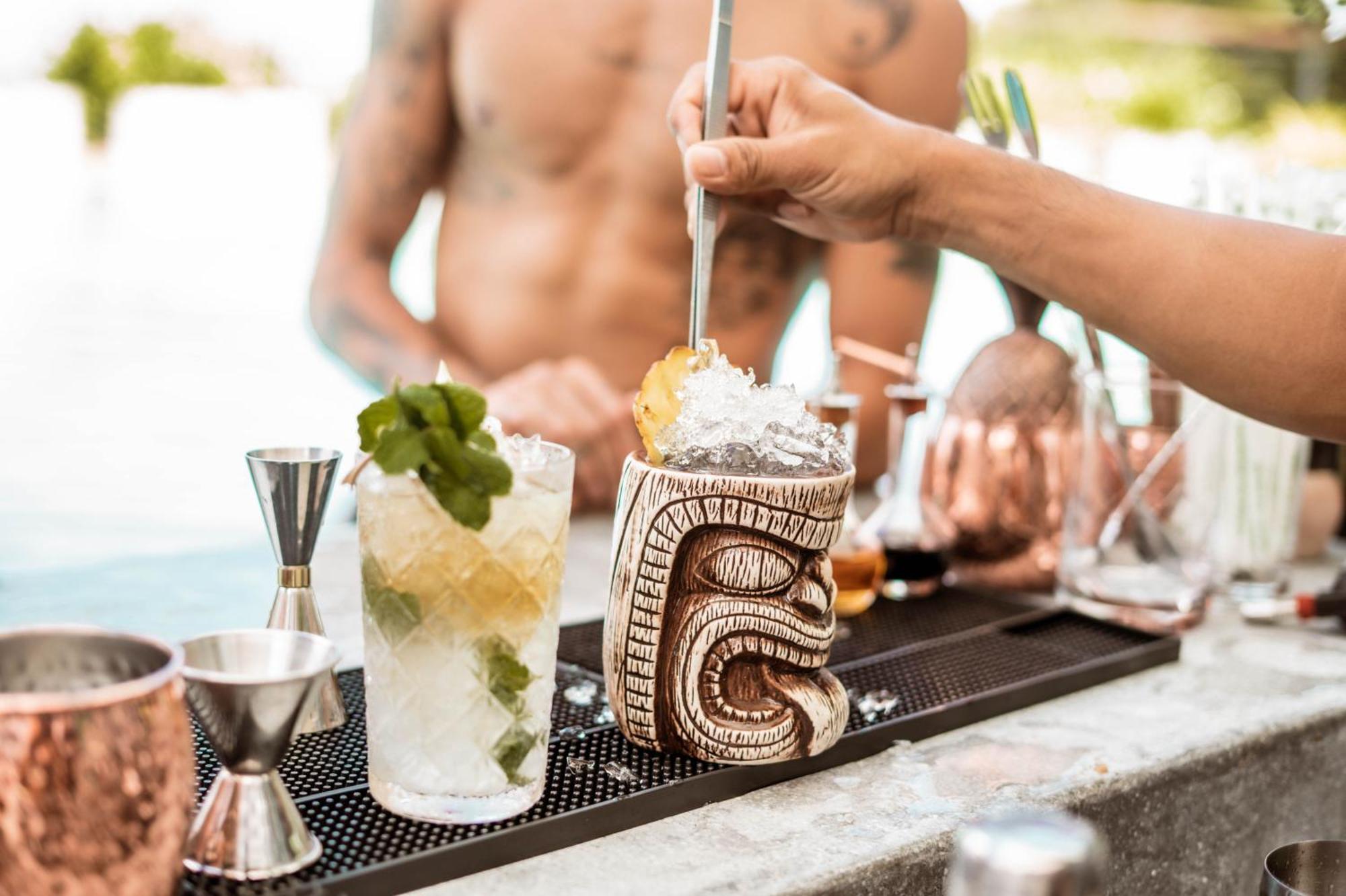 Skyview Resort Phuket Patong Beach Exterior photo A tiki drink being stirred