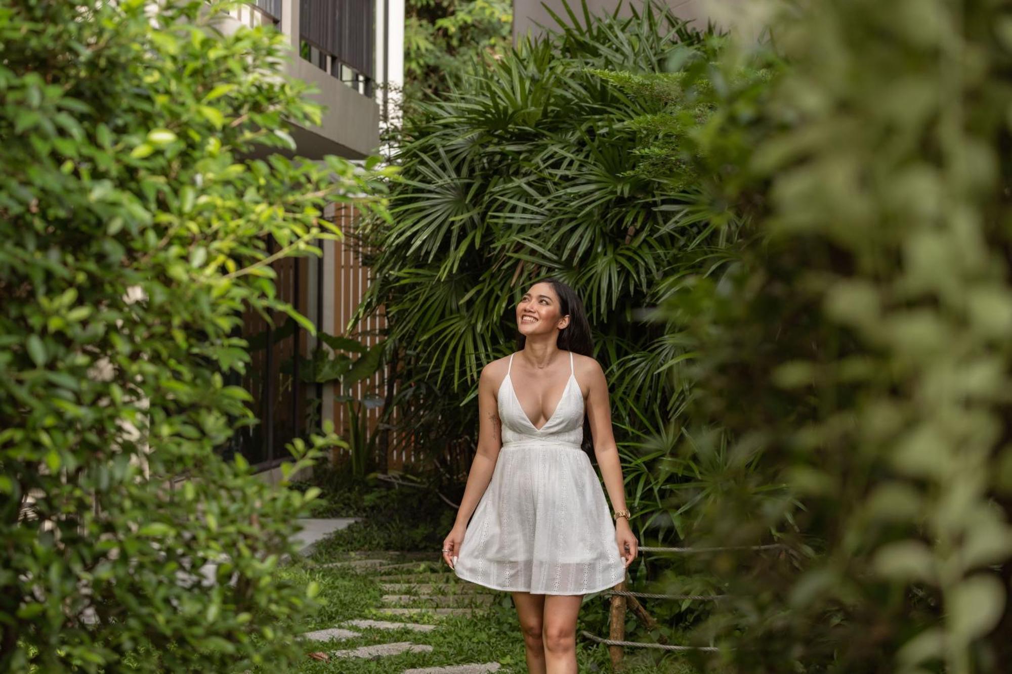 Skyview Resort Phuket Patong Beach Exterior photo A woman wearing a white dress