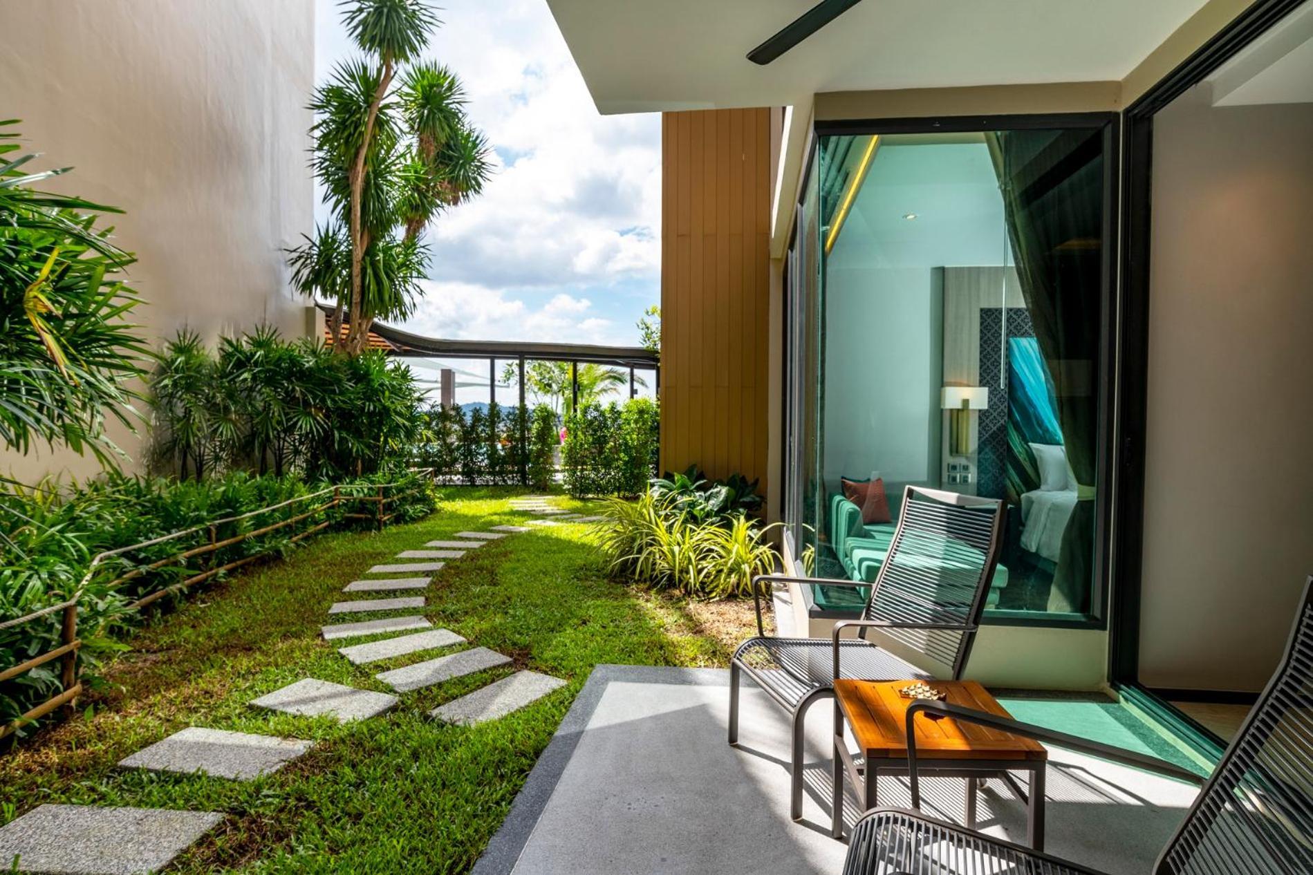 Skyview Resort Phuket Patong Beach Exterior photo A private garden at a hotel in Thailand